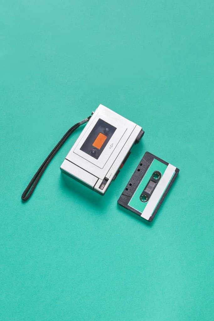 Walkman and cassette on teal
